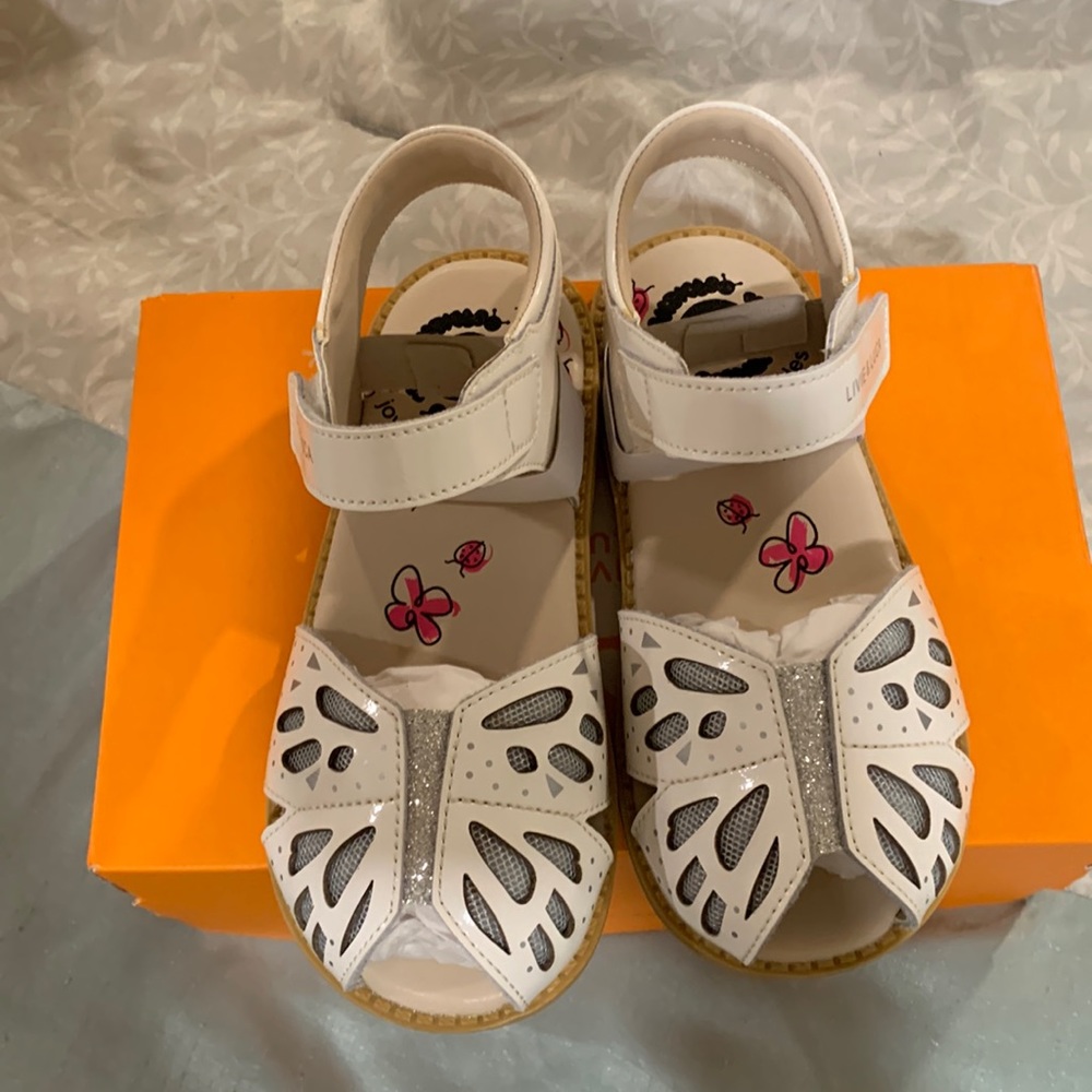 Livie & Luca white patent leather wing style sandals
